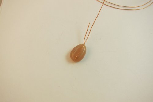 Karen Meador, Ph.D.'s Ellipse Earrings - , Contemporary Wire Jewelry, Coiling, Coiling Wire, Wire Coiling, Loops, Wire Loop, Wrapped Wire Loop, Wire Wrapping, Wrapping, Wire Wrapping Jewelry, Bend the wire coming out of the bottom hole